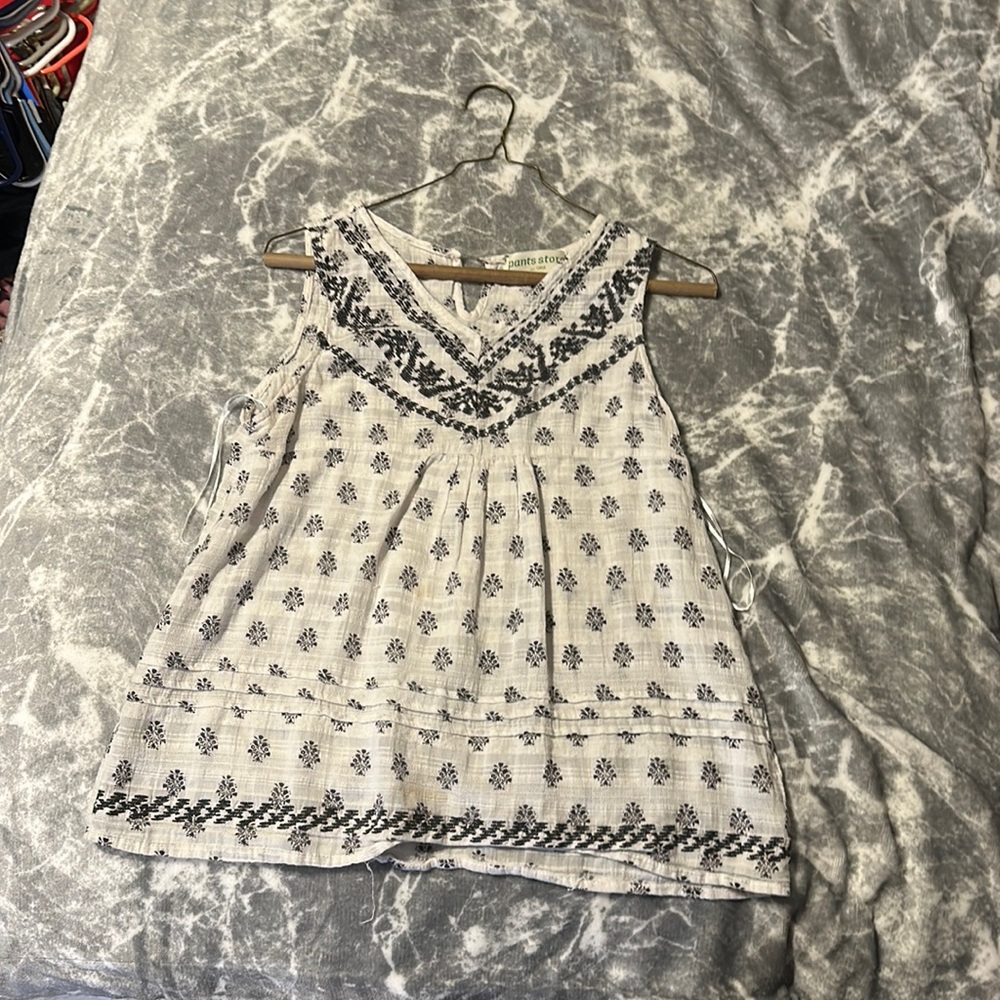 This is a shirt that has been worn quite a bit but is in excellent condition.